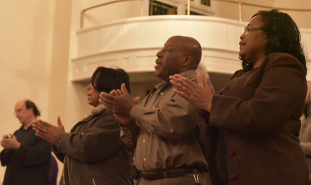 Marva Campbell Davis, right, at the vigil for her son Aaron Campbell.