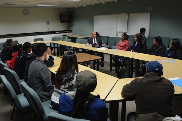 Multnomah County Sheriff Staton speaks with members of the ACT Network.  Photo by Doug Yarrow.