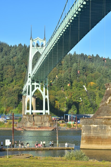 Greenpeace activists dangle from the St. John's Bridge in an effort to keep Shell Oil from drilling in the Arctic. 